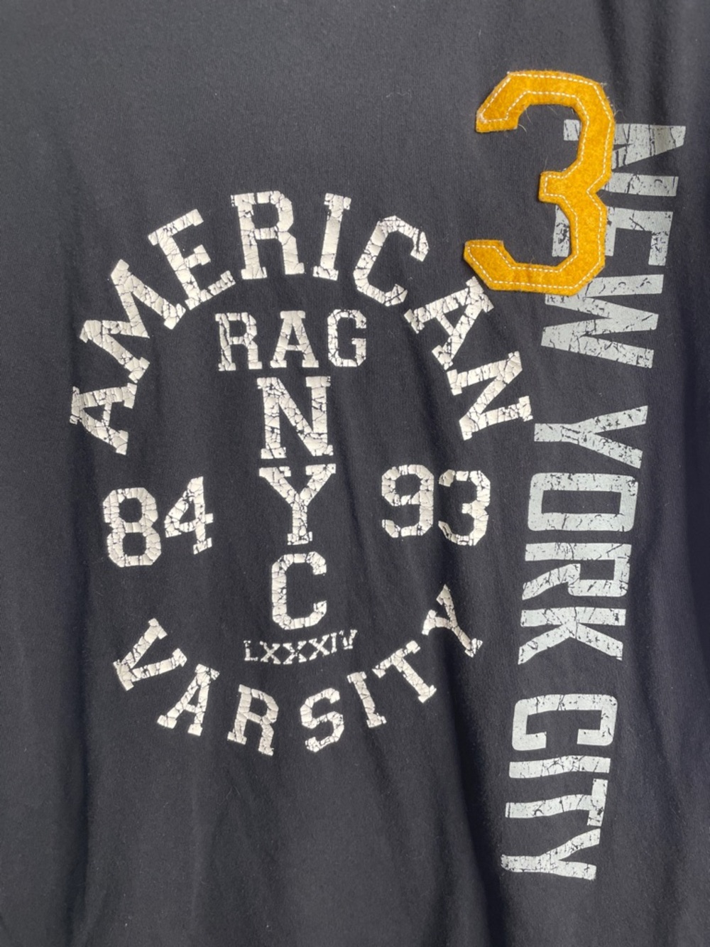 American Rag Black Tee with White Screenprint Logo